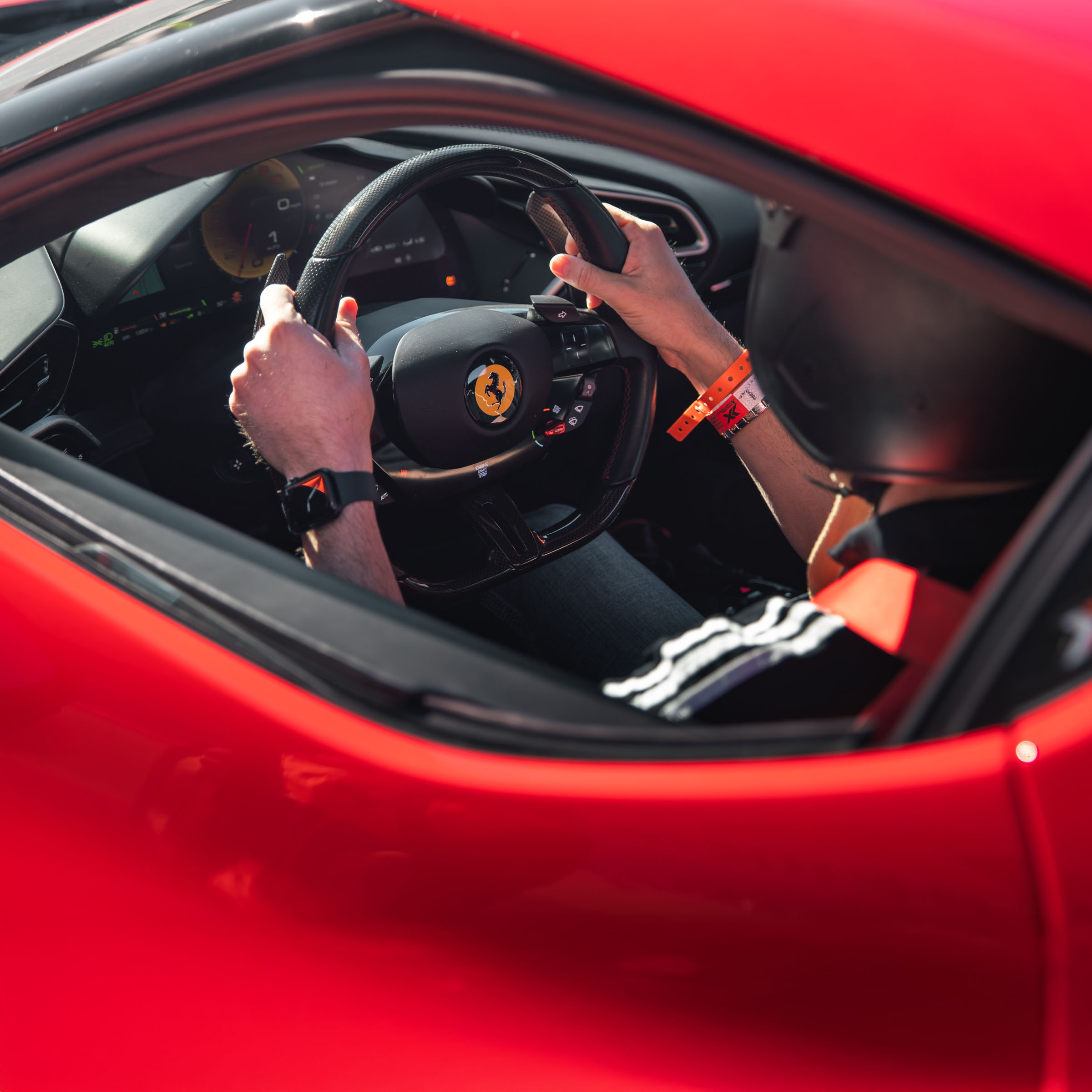 A guest enjoying an Xtreme Xperience supercar event